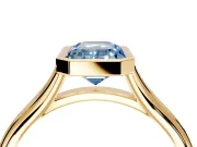 Solitaire Engagement Ring Setting for Fancy Blue Emerald Cut Center with V Split Shank and Bezel Head in Yellow Gold