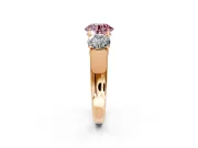 3 Stone Engagement Ring Setting for Fancy Pink Round Cut Center with Raised Basket Heads and Prong Head in Rose Gold