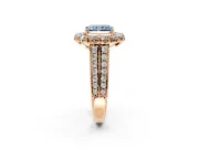 Large Accent Halo Engagement Ring Setting for Fancy Blue Radiant Cut Center with Pave Split Shank and Prong Head in Rose Gold