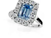 Single Halo Engagement Ring Setting for Fancy Blue Emerald Cut Center with Corner Claws, Plain Band and Prong Head in Platinum