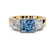 3 Stone Engagement Ring Setting for Fancy Blue Princess Cut Center with Raised Basket Heads and Prong Head in Yellow Gold