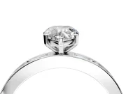 Solitaire Engagement Ring Setting for Pear-Shaped Center with Channel Baguette Band and Prong Head in Platinum