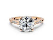 Solitaire Engagement Ring Setting for Round Cut Center with Channel Accents and Prong Head in Rose Gold