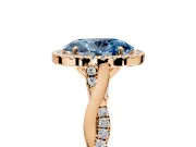 Halo Engagement Ring Setting for Fancy Blue Oval Center with Twist Band and Prong Head in Rose Gold