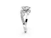 Solitaire Engagement Ring Setting for Pear-Shaped Center with Pave Bypass Twist Band and Prong Head in Platinum