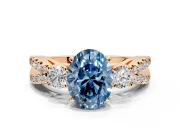 3 Stone Engagement Ring Setting for Fancy Blue Oval Center with Pave Split Shank and Prong Head in Rose Gold