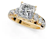 Solitaire Engagement Ring Setting for Princess Cut Center with Graduated Shared Prongs and Prong Head in Yellow Gold