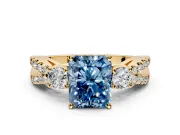 3 Stone Engagement Ring Setting for Fancy Blue Radiant Cut Center with Pave Split Shank and Prong Head in Yellow Gold