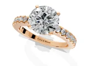 Solitaire Engagement Ring Setting for Round Cut Center with Single Row Accent Band and Prong Head in Rose Gold