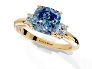 3 Stone Engagement Ring Setting for Fancy Blue Cushion Cut Center with Wide Plain Band and Prong Head in Yellow Gold