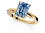 Solitaire Engagement Ring Setting for Fancy Blue Emerald Cut Center with Basket Rail and Prong Head in Yellow Gold