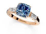 3 Stone Engagement Ring Setting for Fancy Blue Cushion Cut Center with Baguette Accents and Prong Head in Rose Gold