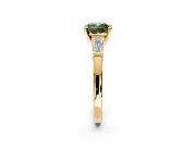 3 Stone Engagement Ring Setting for Fancy Green Cushion Cut Center with Channel Baguette Accents and Prong Head in Yellow Gold
