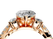 3 Stone Engagement Ring Setting for Heart-Shaped Center with Pave Split Shank and Prong Head in Rose Gold