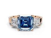 3 Stone Engagement Ring Setting for Fancy Blue Asscher Cut Center with Matching Side Accents and Prong Head in Rose Gold