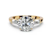 3 Stone Engagement Ring Setting for Round Cut Center with Baguette Accents and Prong Head in Yellow Gold