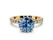 Solitaire Engagement Ring Setting for Fancy Blue Round Cut Center with Fine Pave Band and Claw Prong Head in Yellow Gold