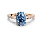 Solitaire Engagement Ring Setting for Fancy Blue Oval Center with Channel Accents and Prong Head in Rose Gold