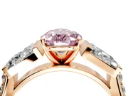 Channel-Set Engagement Ring Setting for Fancy Pink Pear-Shaped Center with Baguette Band and Prong Head in Rose Gold