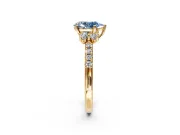 Paired Accent Engagement Ring Setting for Fancy Blue Pear-Shaped Center with Pave Band and Prong Head in Yellow Gold