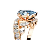 Solitaire Engagement Ring Setting for Fancy Blue Pear-Shaped Center with Pave Bypass Twist Band and Prong Head in Rose Gold