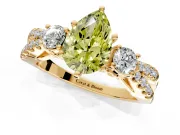 3 Stone Engagement Ring Setting for Fancy Yellow Pear-Shaped Center with Pave Split Shank and Prong Head in Yellow Gold