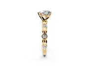 Solitaire Engagement Ring Setting for Heart-Shaped Center with Beaded Bezel Station Band and Prong Head in Yellow Gold