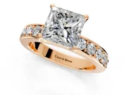 Solitaire Engagement Ring Setting for Princess Cut Center with Channel-Set Accents and Prong Head in Rose Gold