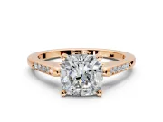 Solitaire Engagement Ring Setting for Cushion Cut Center with Channel Accents and Prong Head in Rose Gold