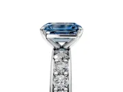 Solitaire Engagement Ring Setting for Fancy Blue Emerald Cut Center with Channel-Set Accents and Prong Head in Platinum