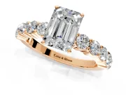 Shared-Prong Engagement Ring Setting for Emerald Cut Center with Graduated Accents and Prong Head in Rose Gold