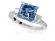 3 Stone Engagement Ring Setting for Fancy Blue Princess Cut Center with Round Cut Side Accents and Prong Head in White Gold