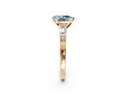 Bar-Set Engagement Ring Setting for Fancy Blue Pear-Shaped Center with Tapered Baguette Accents and Prong Head in Rose Gold