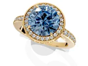 Halo Engagement Ring Setting for Fancy Blue Round Cut Center with Metal-Rimmed Halo, Pave Band and Prong Head in Yellow Gold