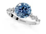 Cluster Engagement Ring Setting for Fancy Blue Round Cut Center with Round Cut Accent Band and Prong Head in White Gold