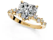 Solitaire Engagement Ring Setting for Heart-Shaped Center with Trailing Leaf Accent Band and Prong Head in Yellow Gold