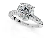 Solitaire Engagement Ring Setting for Round Cut Center with Crossover Accents and Prong Head in Platinum