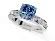 Solitaire Engagement Ring Setting for Fancy Blue Cushion Cut Center with Channel-Set Accents and Prong Head in Platinum
