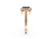 Floral Halo Engagement Ring Setting for Fancy Blue Emerald Cut Center with Large Halo Accents and Prong Head in Rose Gold