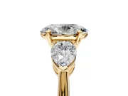 3 Stone Engagement Ring Setting for Oval Center with Large Pear-Shaped Accents and Prong Head in Yellow Gold