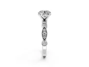 Solitaire Engagement Ring Setting for Round Cut Center with Milgrain Bezel Accents and Prong Head in Platinum