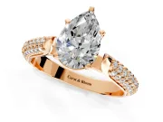 Solitaire Engagement Ring Setting for Pear-Shaped Center with Multi-Row Accents and Prong Head in Rose Gold