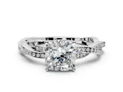 Solitaire Engagement Ring Setting for Cushion Cut Center with Twisted Pave Band and Prong Head in Sterling Silver