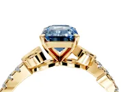 Leaf Motif Engagement Ring Setting for Fancy Blue Emerald Cut Center with Pave Band and Prong Head in Yellow Gold