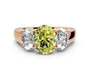 3 Stone Engagement Ring Setting for Fancy Yellow Oval Center with Raised Basket Heads and Prong Head in Rose Gold