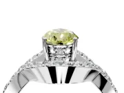 Halo Engagement Ring Setting for Fancy Yellow Pear-Shaped Center with Pave Infinity Twist Band and Prong Head in White Gold
