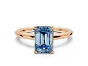 Hidden Halo Engagement Ring Setting for Fancy Blue Emerald Cut Center with Thin Rounded Band and Prong Head in Rose Gold