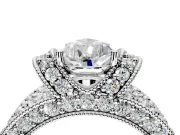 Pave Engagement Ring Setting for Pear-Shaped Center with Curved Accent Rows, Openwork and Prong Head in Platinum