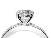 Solitaire Engagement Ring Setting for Heart-Shaped Center with Channel-Set Accents and Prong Head in White Gold