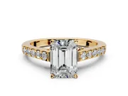 Solitaire Engagement Ring Setting for Emerald Cut Center with Crossover Accents and Prong Head in Yellow Gold